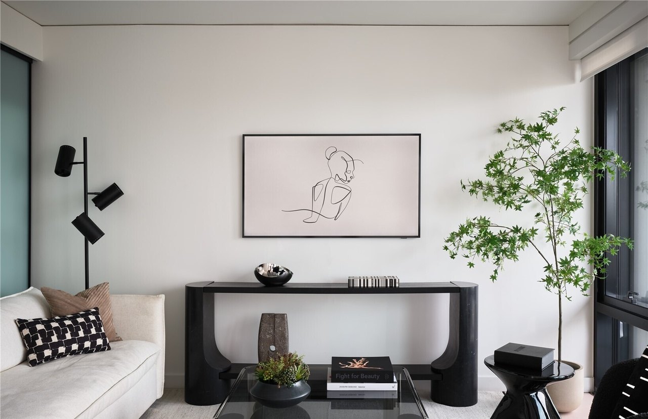 Living room console and art, Residence 2911, sold furnished