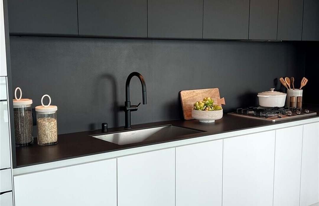 Chef's kitchen with gas range and full-height cabinetry, Residence 2911