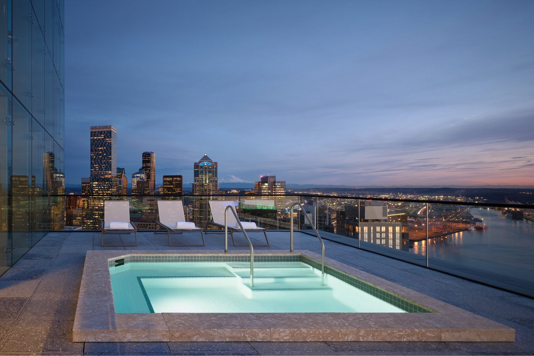 Rooftop hot tub at dusk, First Light Seattle