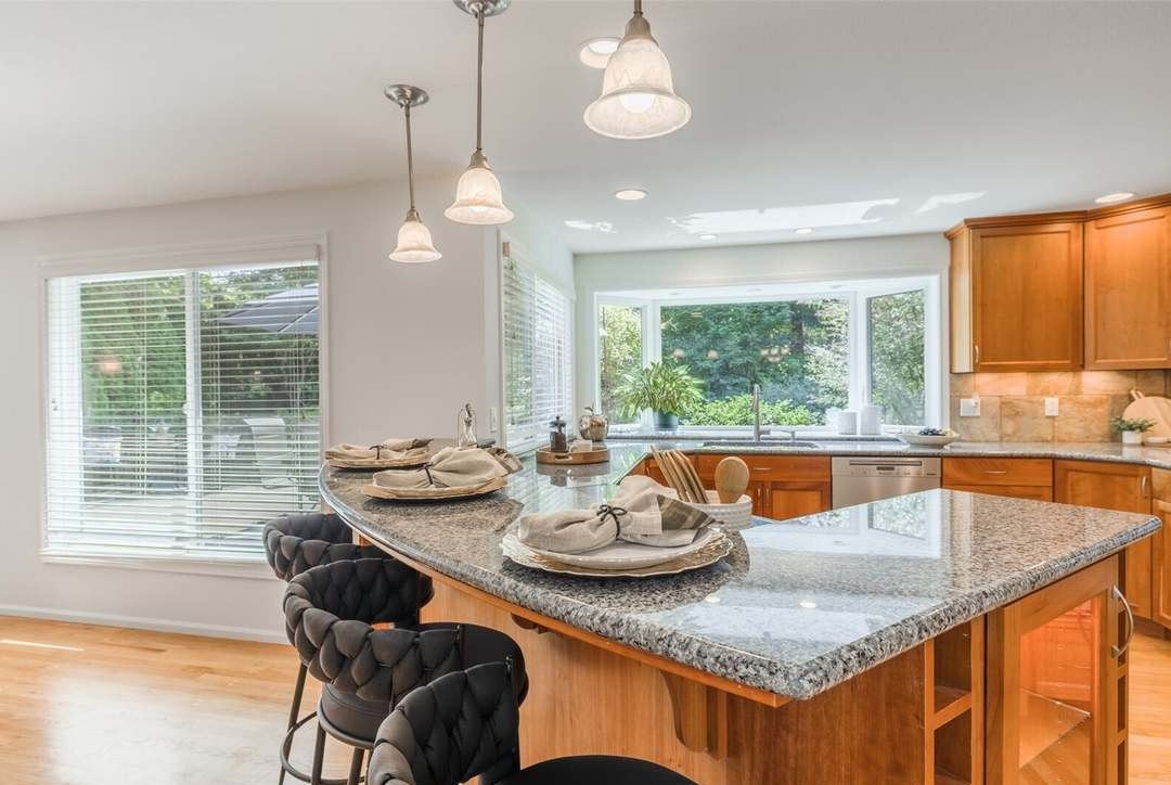 Kitchen with Dacor and Miele appliances and granite island, Wilburton, Bellevue