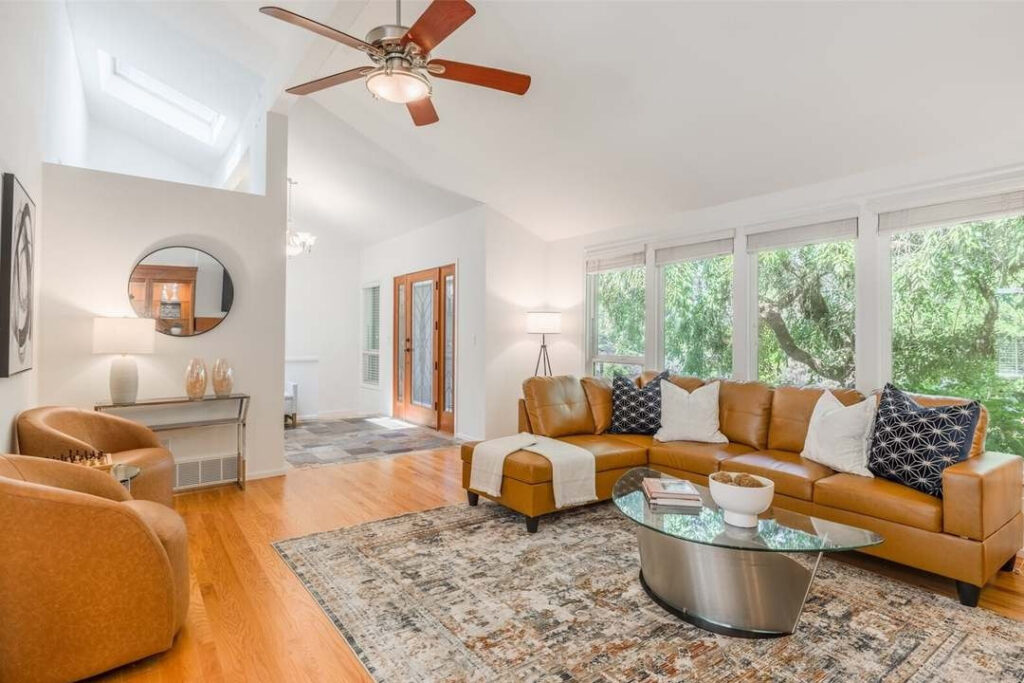 Vaulted mid-century living room with clerestory windows at 12617 NE 5th St, Wilburton, Bellevue
